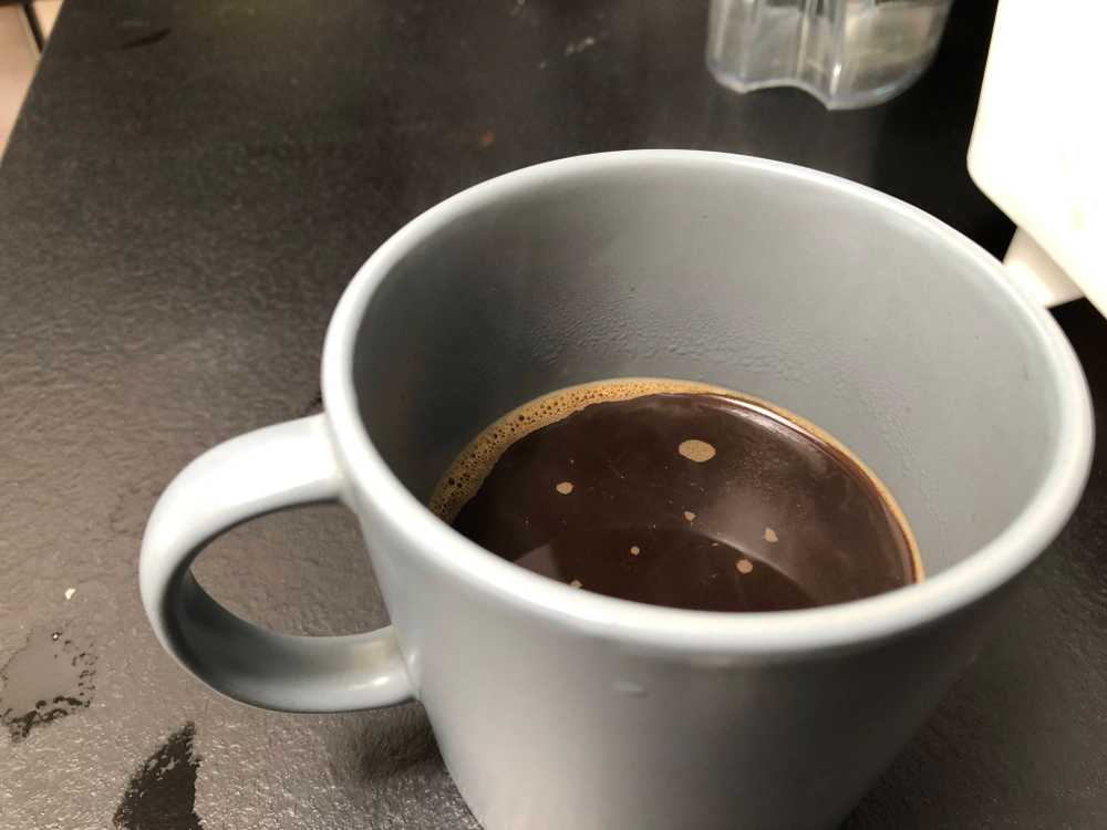 photo of black coffee in a mug