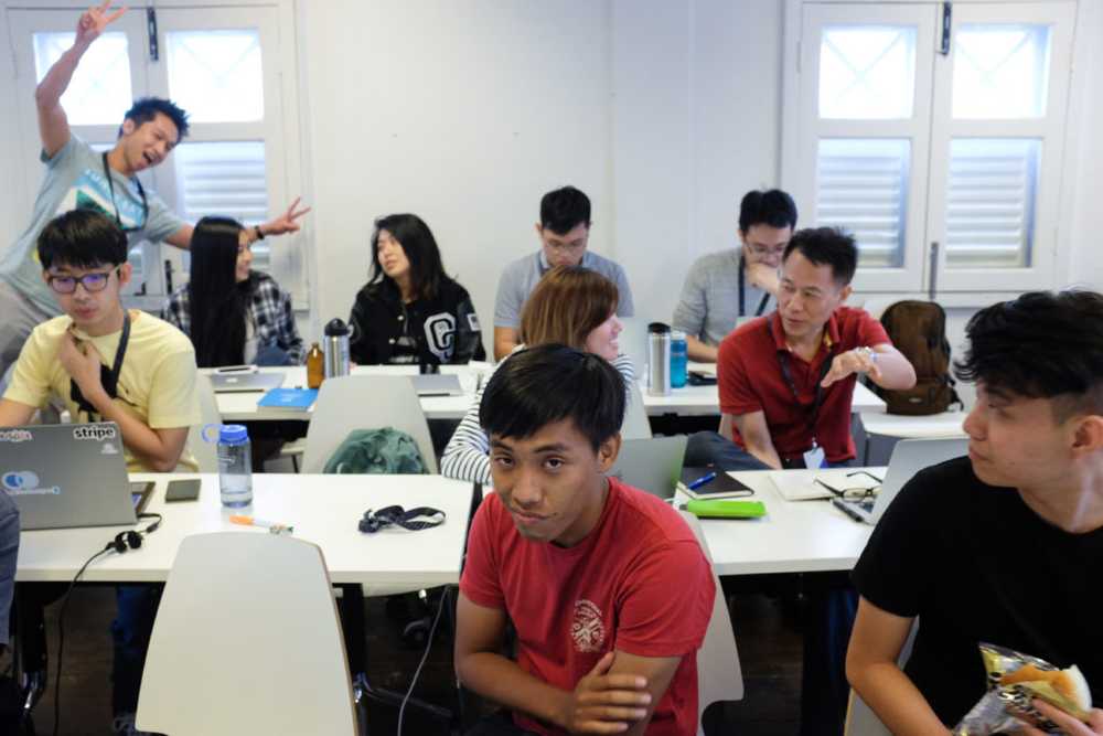 classroom of students at general assembly singapore learning programming