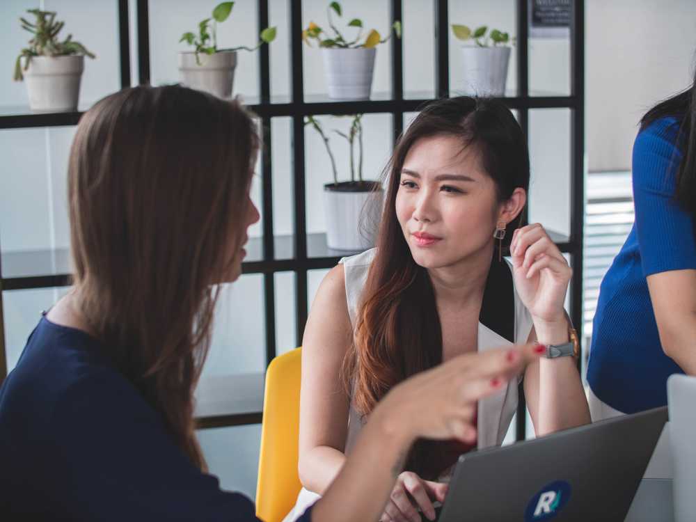 woman listening to another person talk